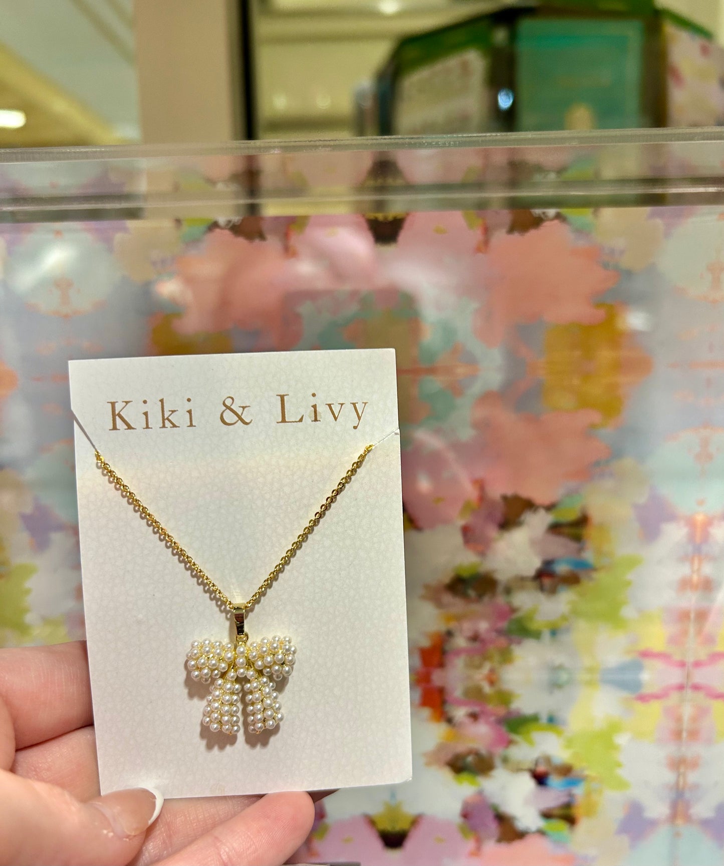 Gold Pearl Bow Necklace