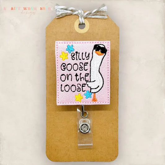 Silly Goose on the Loose Badge Reel - pink: Black / Swivel