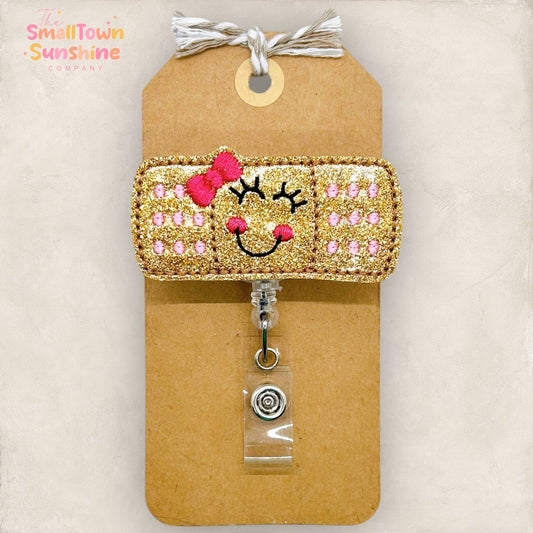 Adhesive Bandage with Bow Badge Reel - pink: Clear / Swivel